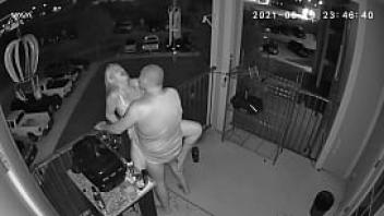 Couple caught on the balcony